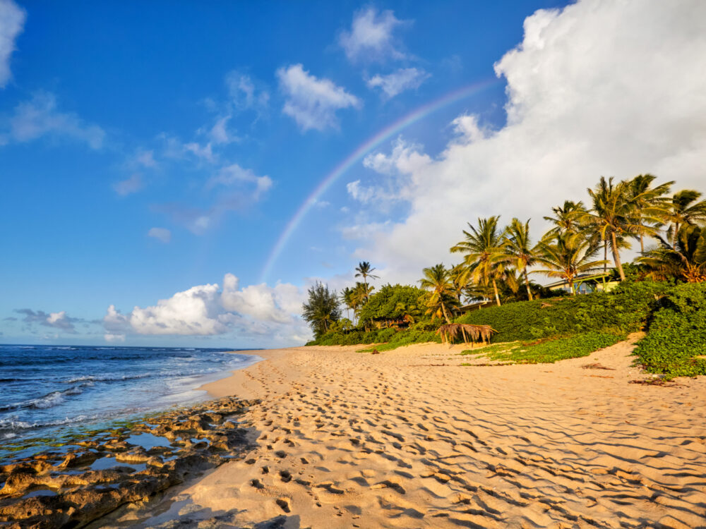 Gorgeous rainbow over one of our top picks for where to stay in Oahu, the North Shore