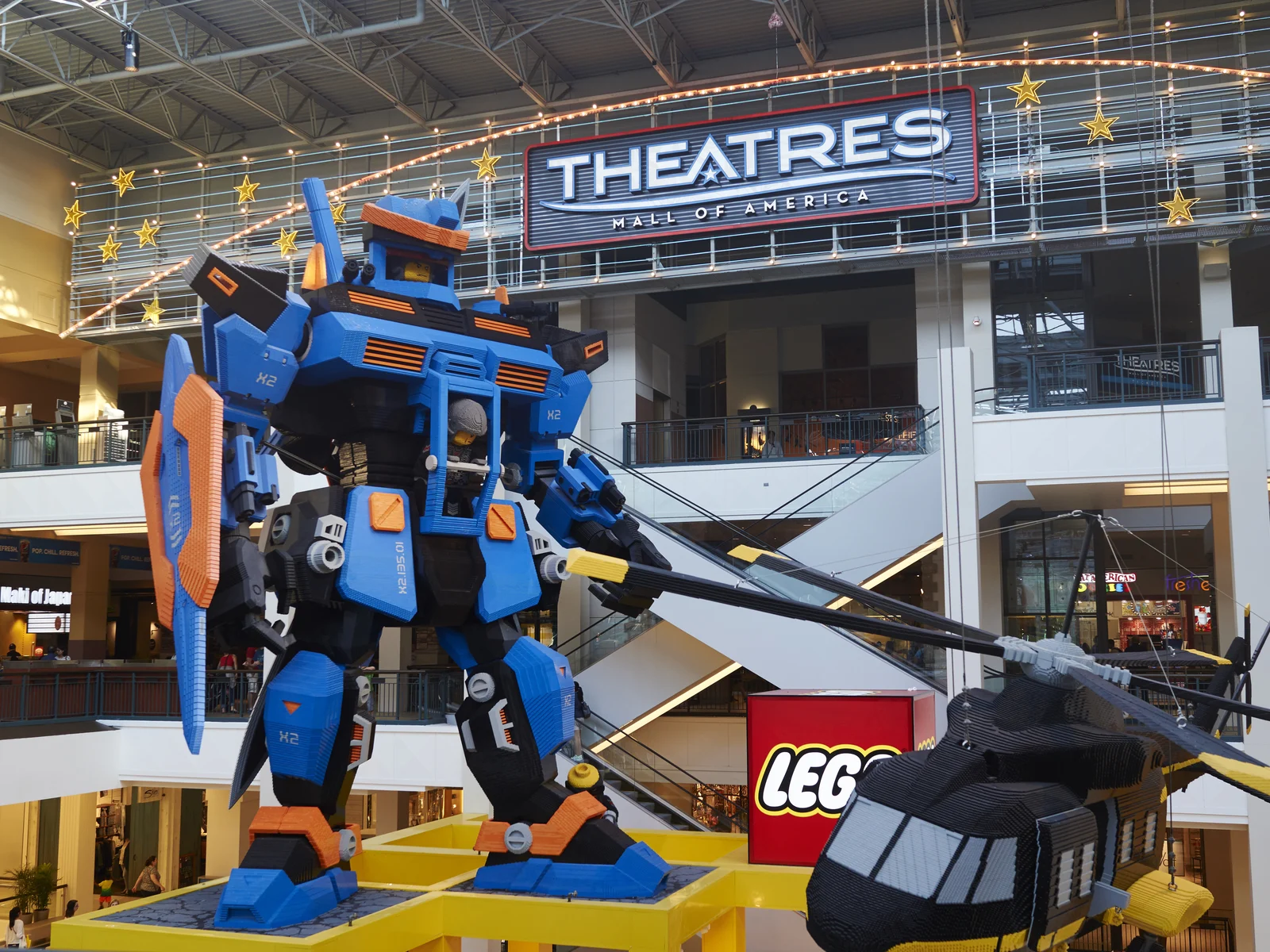 A giant lego robot and helicopter displayed at the LEGO Store in Mall of America, one of the best toy stores in America