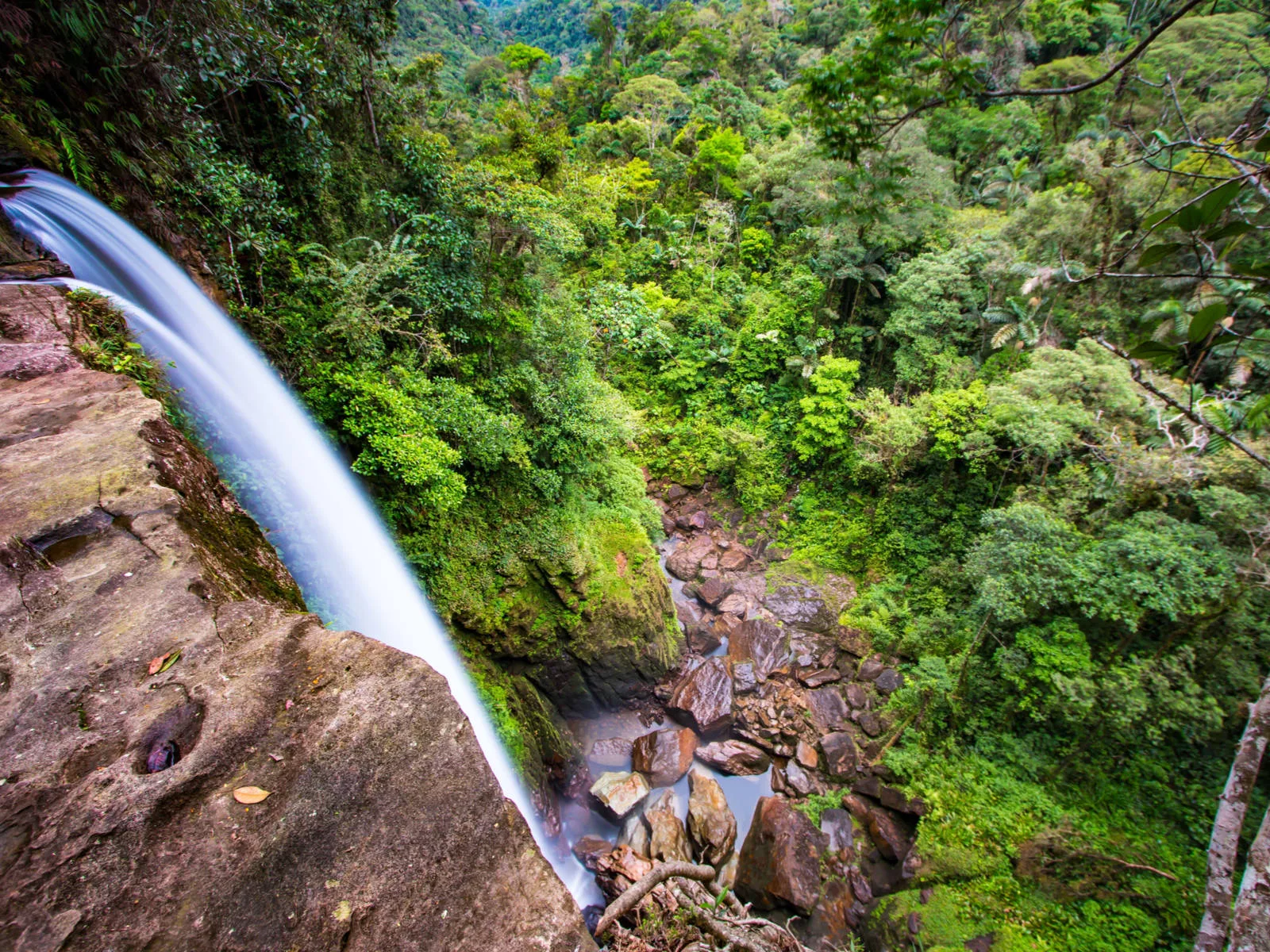 Waterfall in the Amazon pictured during the best time to visit Colombia