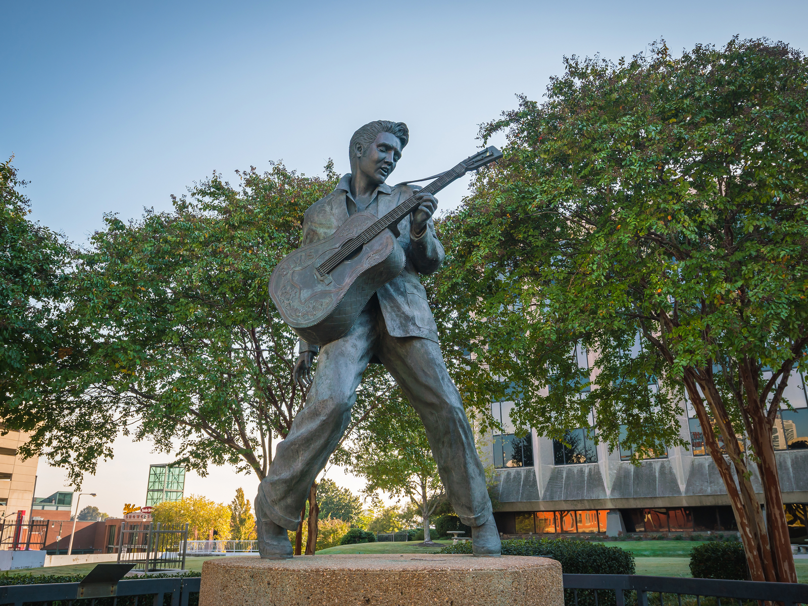 Statue of Elvis Presley on his signature pose and passionately holding a guitar in Elvis Presley Plaza, Memphis, one of the best places to visit in Tennessee