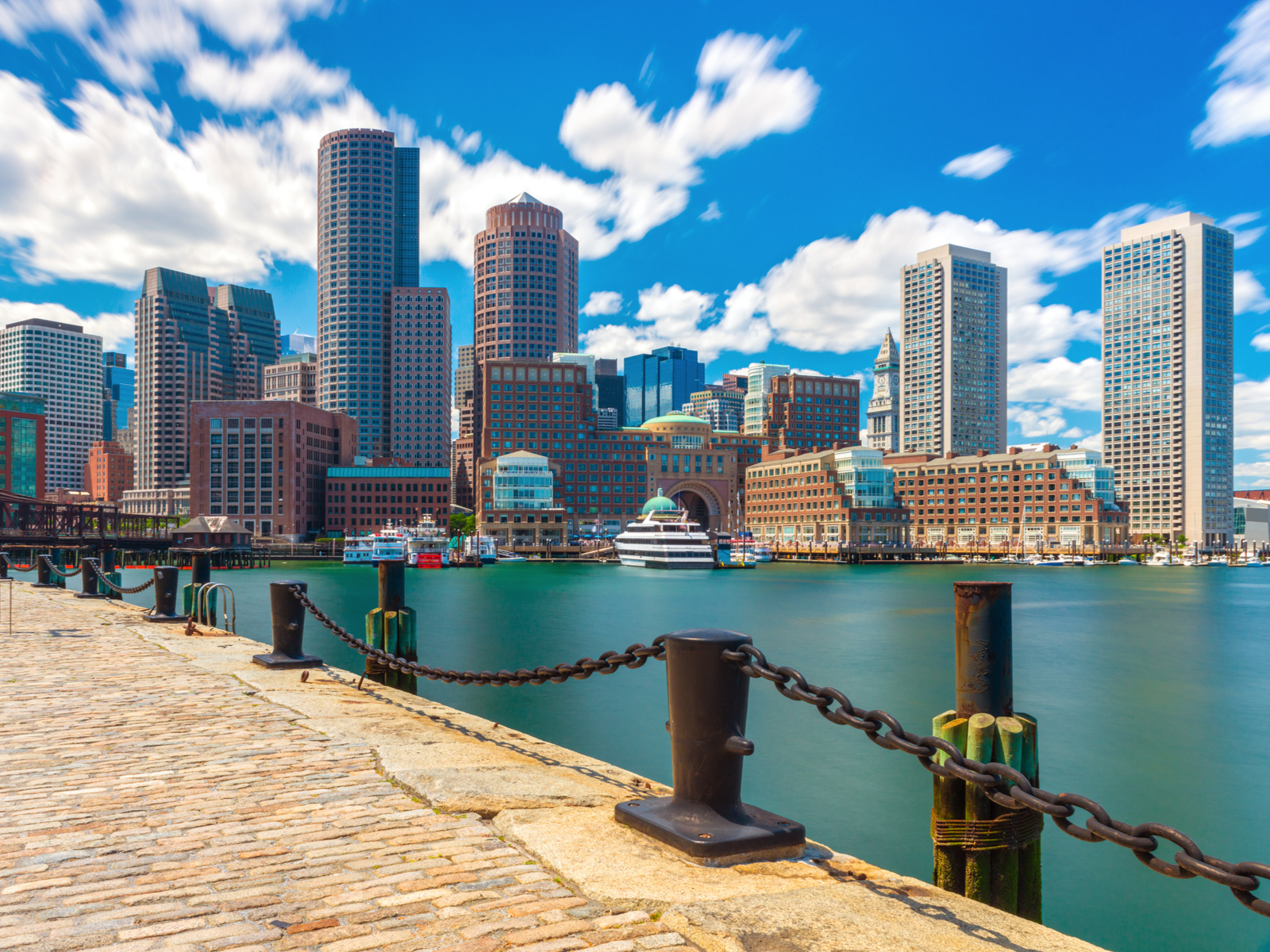 Neat view of the bay area with the downtown skyline in view for a piece on the best hotels in Boston