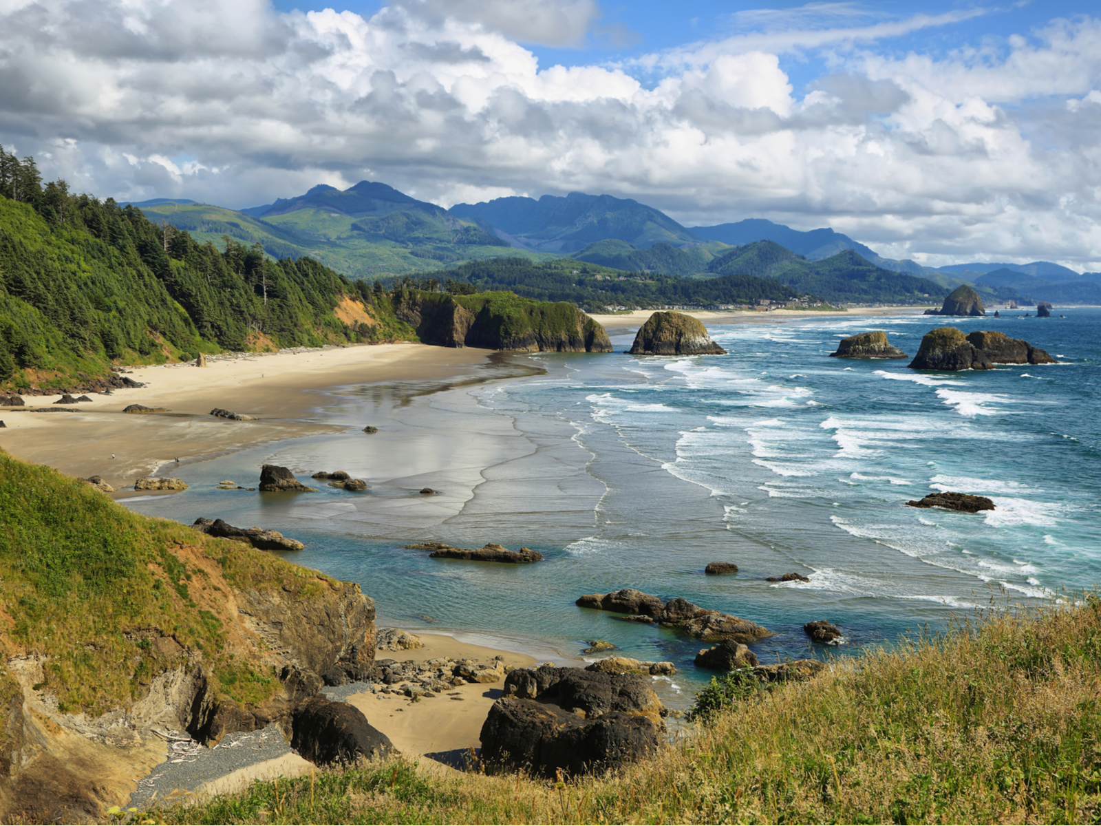 Cannon Beach and Indian Hills on a cloudy day, one of the best places to visit in Oregon