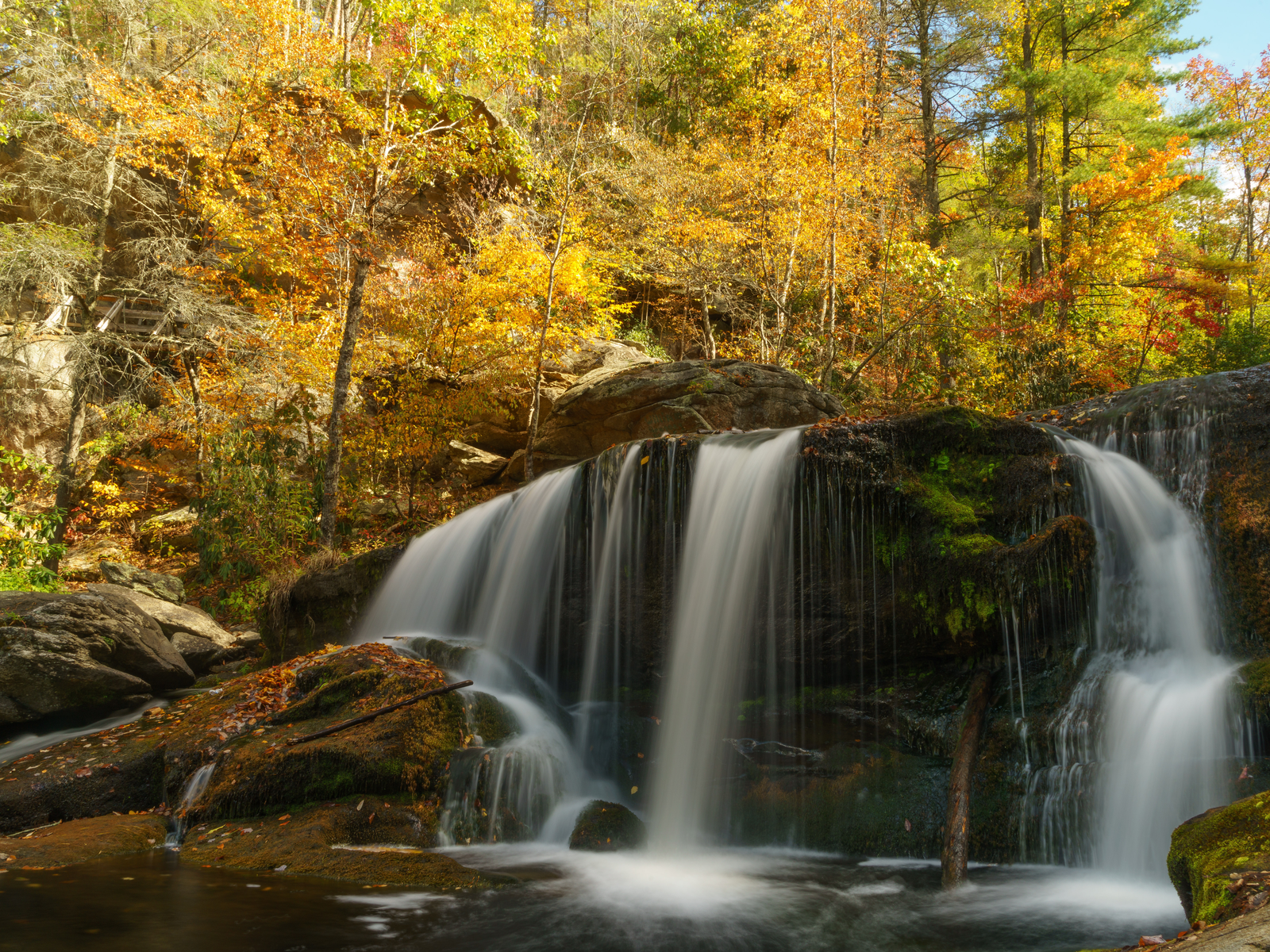 Calm Bald River Falls in Cherokee National Forest, one of the best places to visit in Tennessee, on an Autumn season