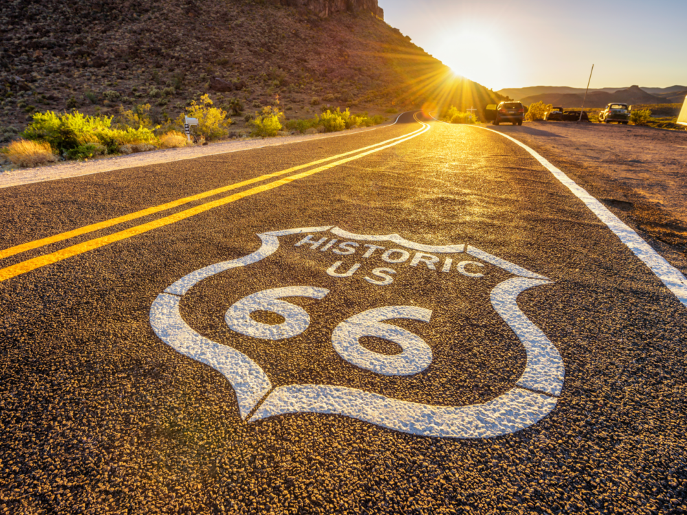 Photo of the Route 66 sign, one of the best American landmarks, painted on the road