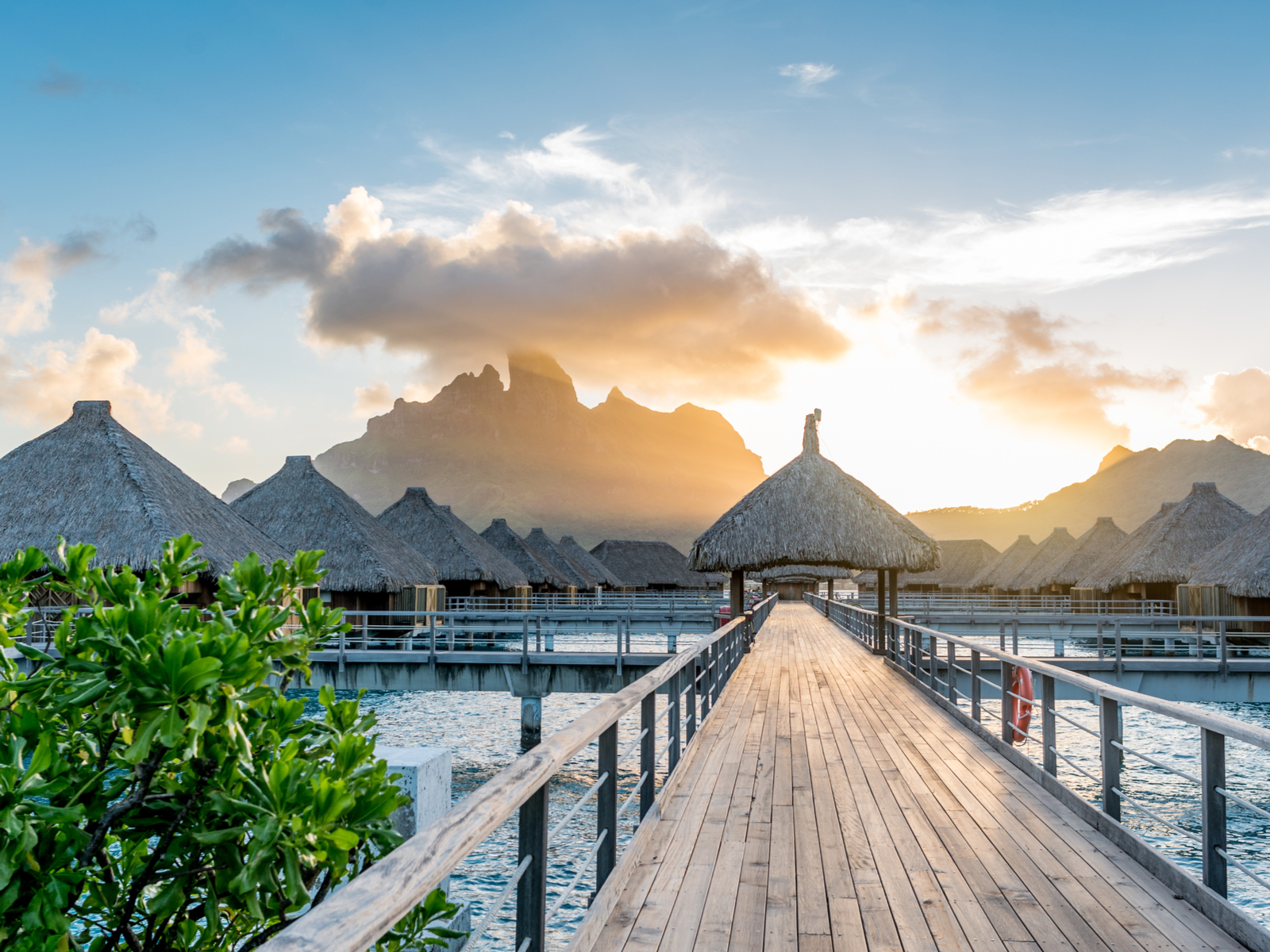 Bore bora pictured during the best time to go with few clouds and lots of sun