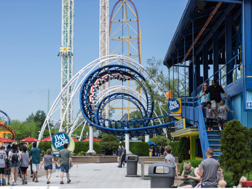 Photo of Cedar Point, one of the best things to do in Ohio, pictured in front of a big roller coaster