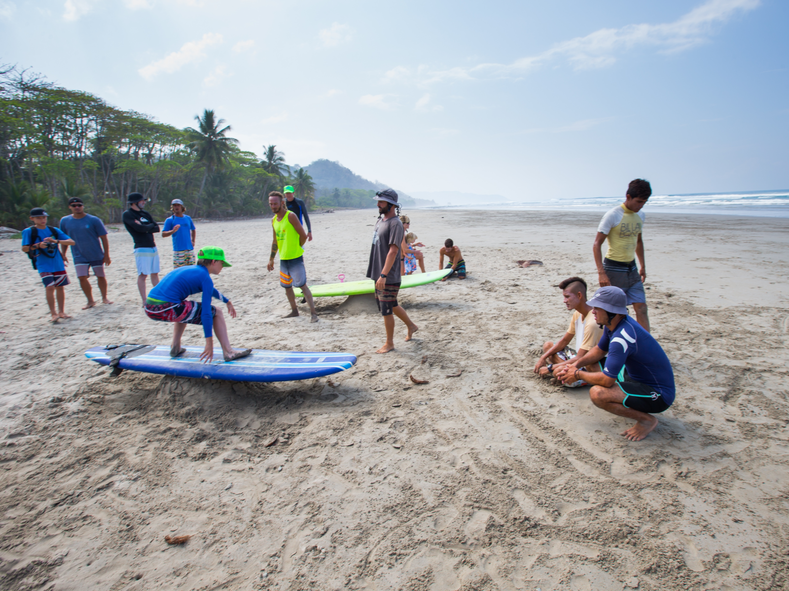 Tourists learning to surf at one of the best beaches in Costa Rica, Santa Teresa