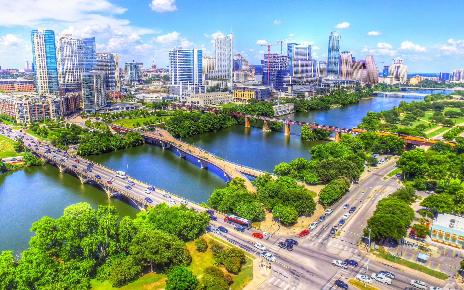 Aerial view of the Austin skyline over Ladybird Lake for a piece on the best things to do in Austin Texas