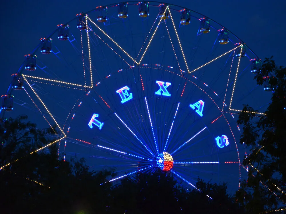 Word Texas on a ferris wheel, a great thing to do when staying at one of the best hotels in Dallas