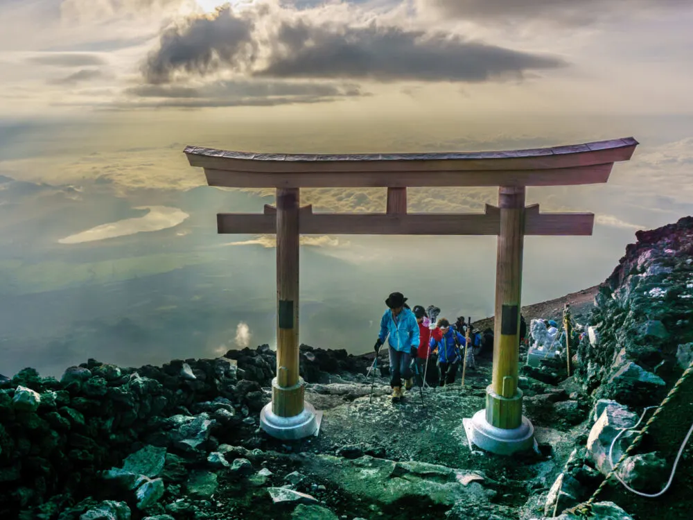 People hiking one of the best places to visit in Japan, Mount Fuji