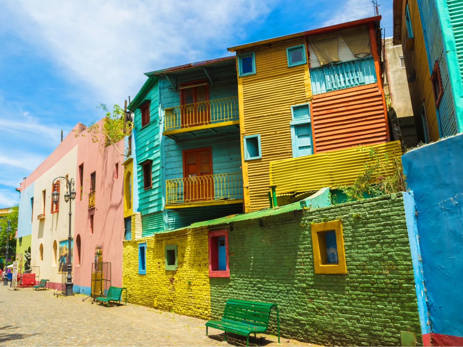 Pretty and colorful houses in Caminito pictured during the best time to visit Argentina