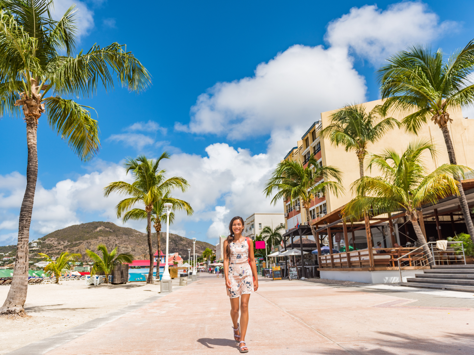 Woman in St Martin during the least busy time to visit the Caribbean