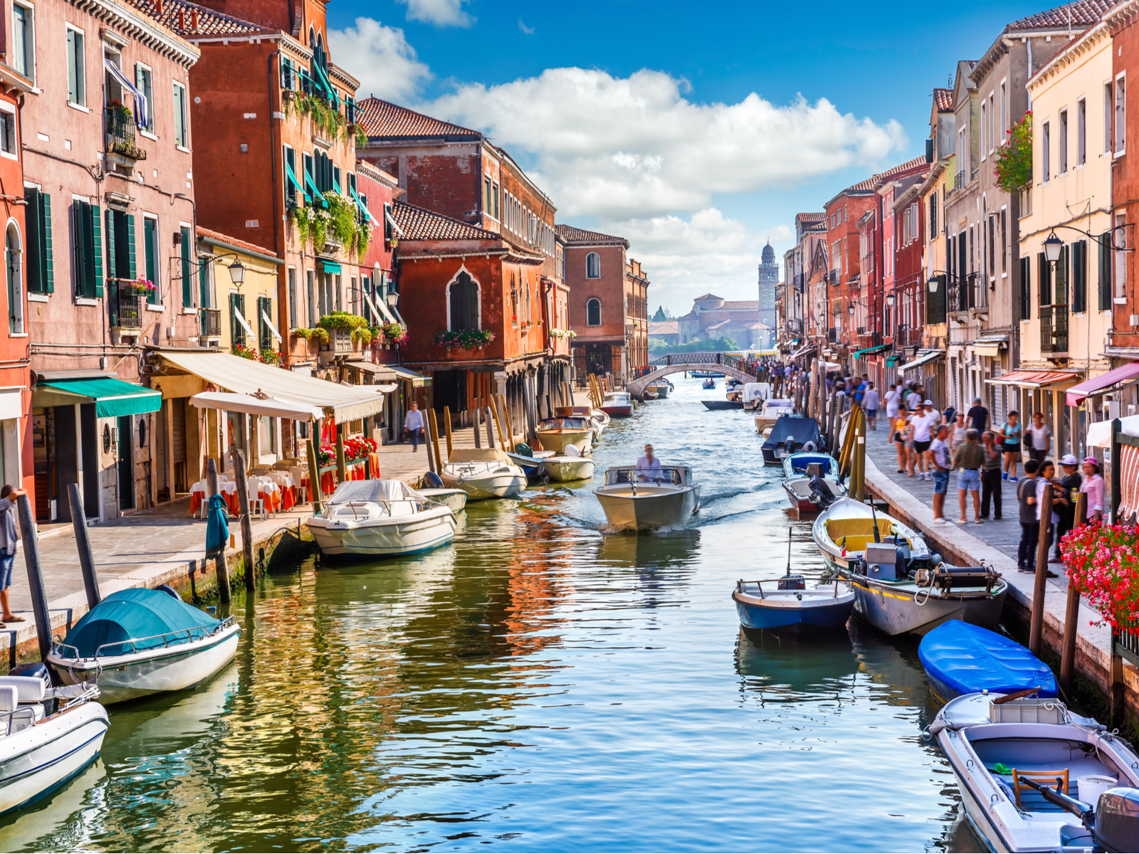 Canals in Venice, one of the best places to visit in Italy, as seen in the Summer