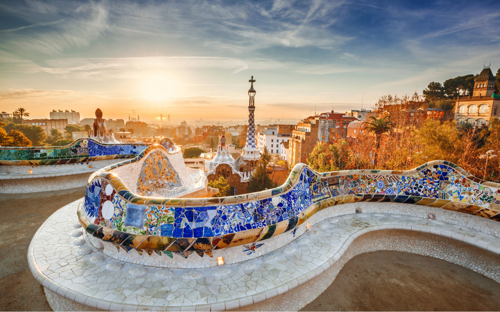 Neat sunset view of the park with mosaics and benches as seen during the best time to visit Barcelona