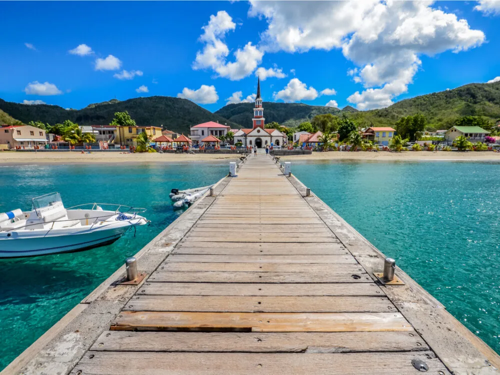 Long dock walkway in Martinique Anse d'Arlet, one of the safest islands in the Caribbean