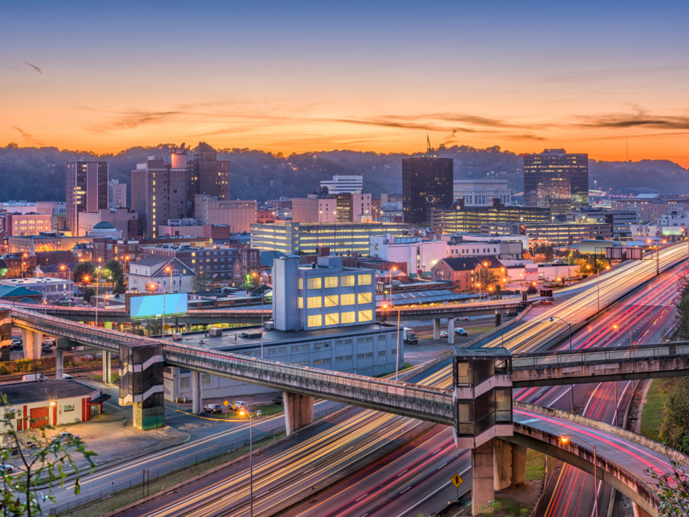 Skyline of Charleston, West Virginia on a sunset and high exposure photo of its wide highways, a piece on the things to do in Virginia