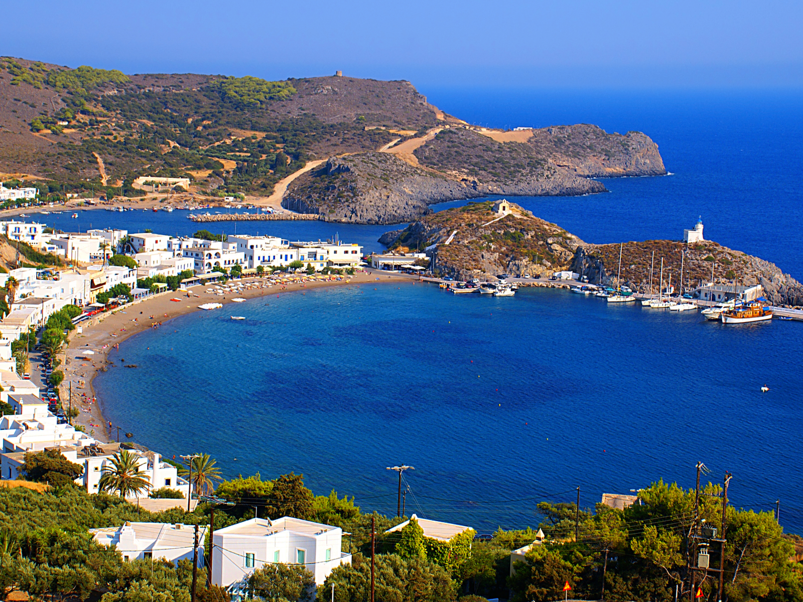 Beautiful white structures lined up by the beach at Kapsali Village in Kythira Island, one of the best places to visit in Greece