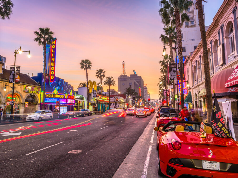 Hollywood walk of fame and the TCL theater, one of the best things to do in Los Angeles, pictured at dusk