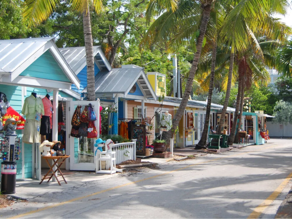 Empty street in front of little tin-roofed huts outside the best hotels in Key West