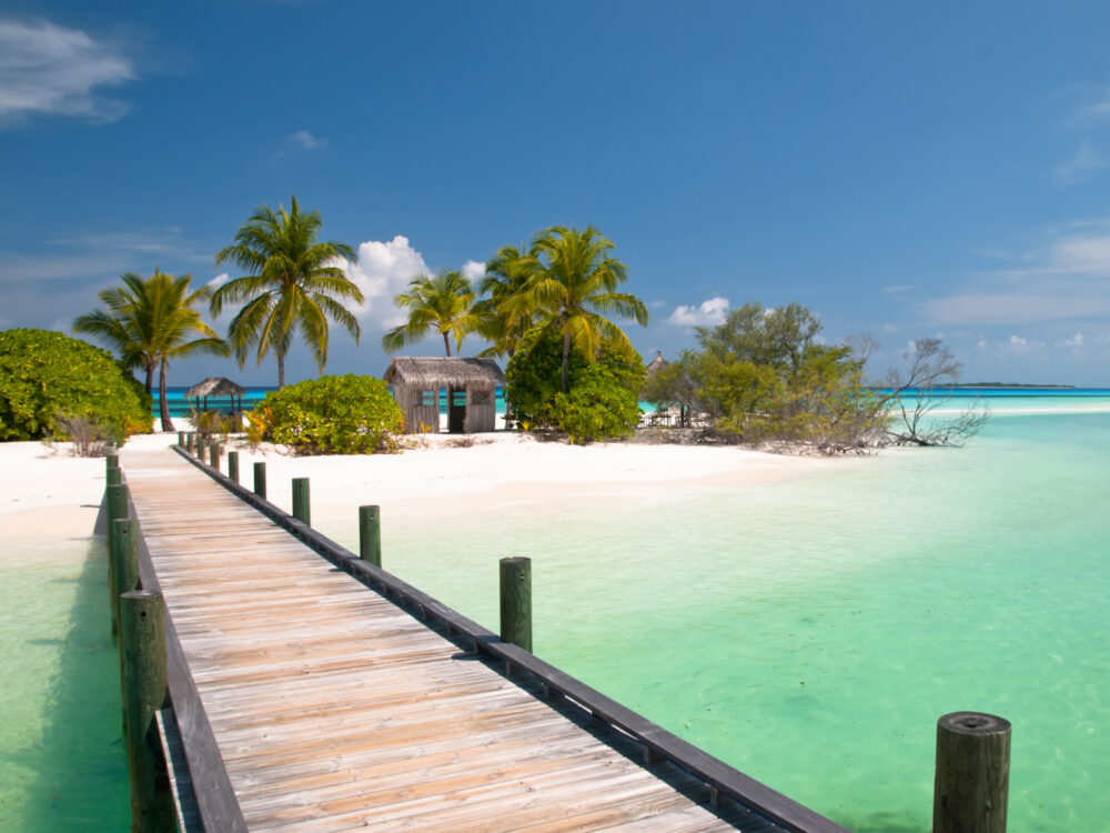 Tropical jetty on an island during the best time to visit the Bahamas