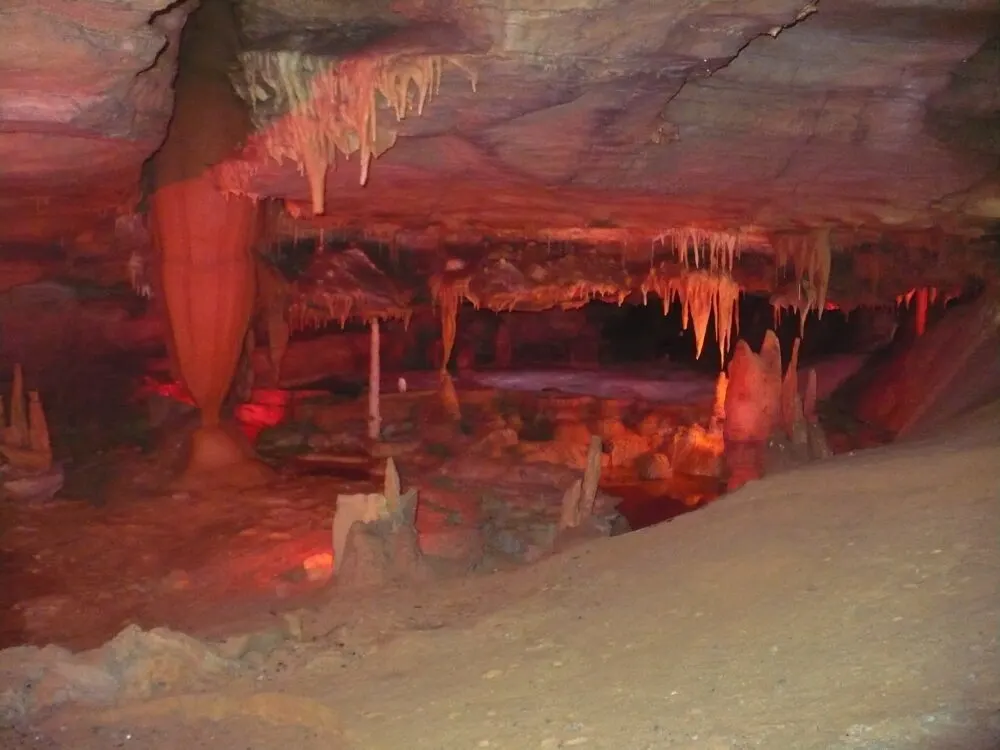 illuminated stalactites and stalagmites, mystical rock formations in forbidden caverns, one of the best things to do in pigeon forge