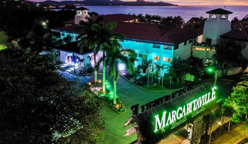 Margaritaville Beach Resort Playa Flamingo, one of the best all-inclusive resorts in Costa Rica, pictured at night