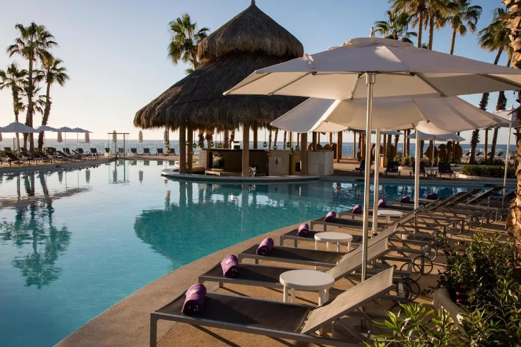 Paradisus Los Cabos, one of our picks for the best all-inclusive resorts in Cabo, pictured by the pool area