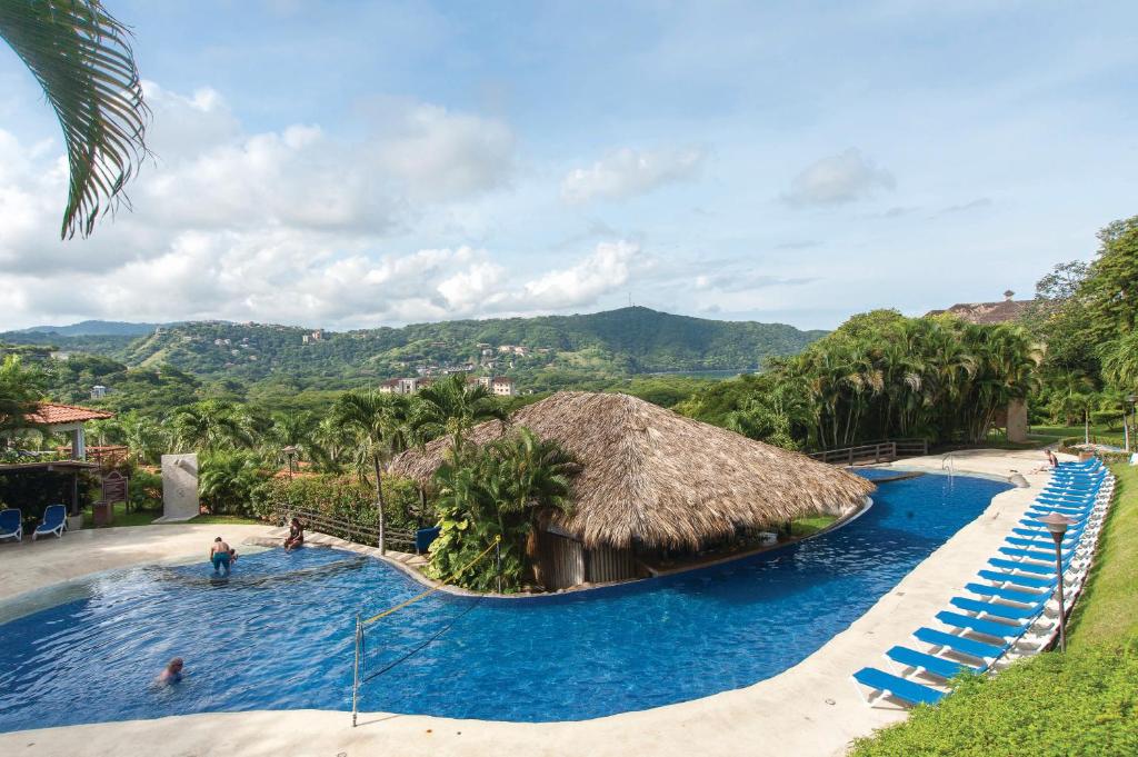 Pool area at the Villas Sol Hotel & Beach Resort, one of the best all-inclusive resorts in Costa Rica