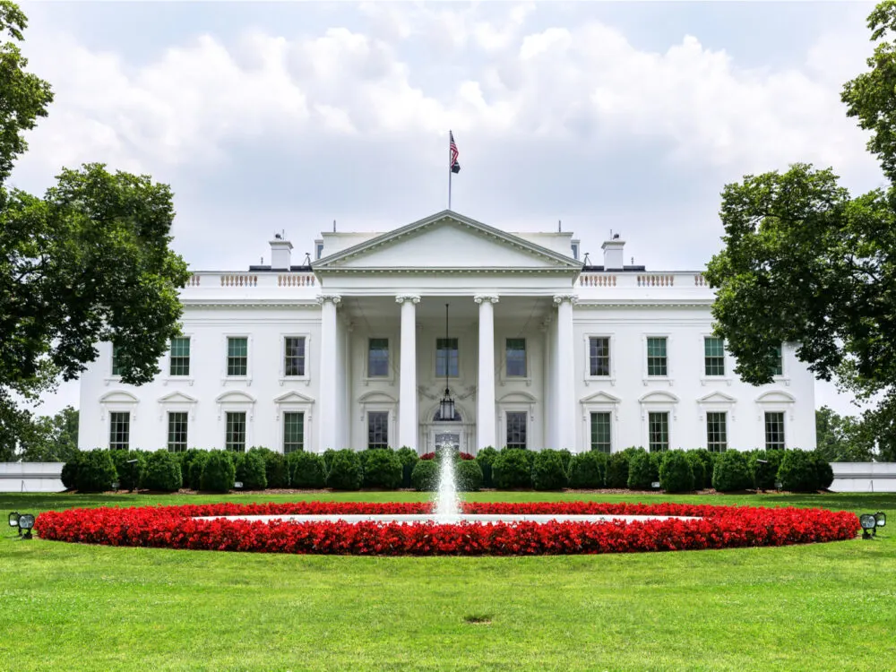 The White House, with an intricate landscape and mowed grass, listed as one of the best things to do in Washington, D.C.