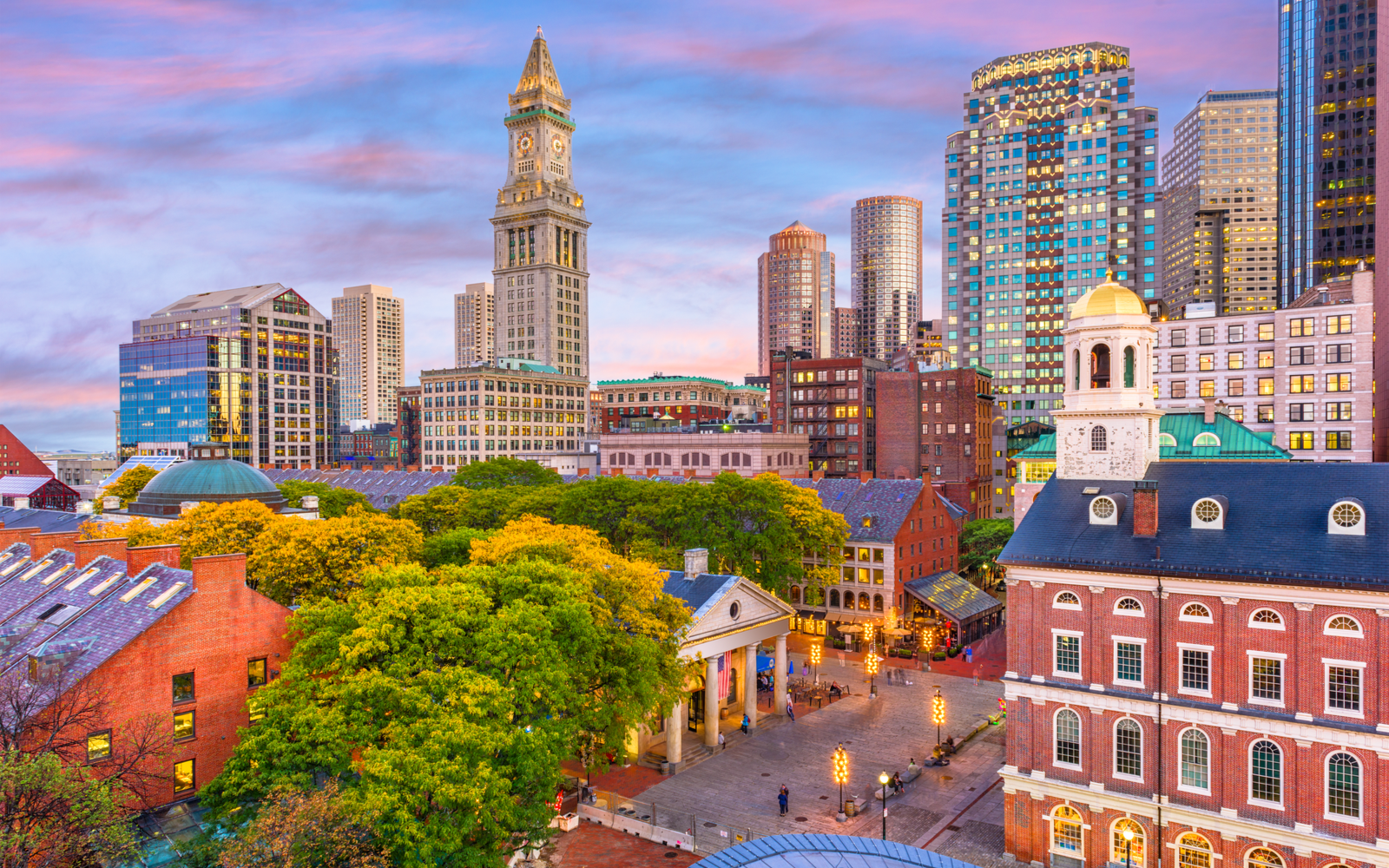 Skyline of the downtown area in Boston, one of the most beautiful cities in the US, pictured at sunrise