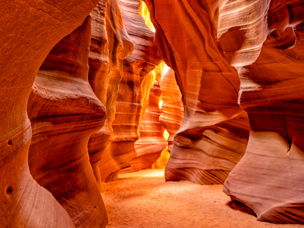 Light shining down on orange rocks at Antelope Canyon in Arizona, one of the most beautiful places in the US