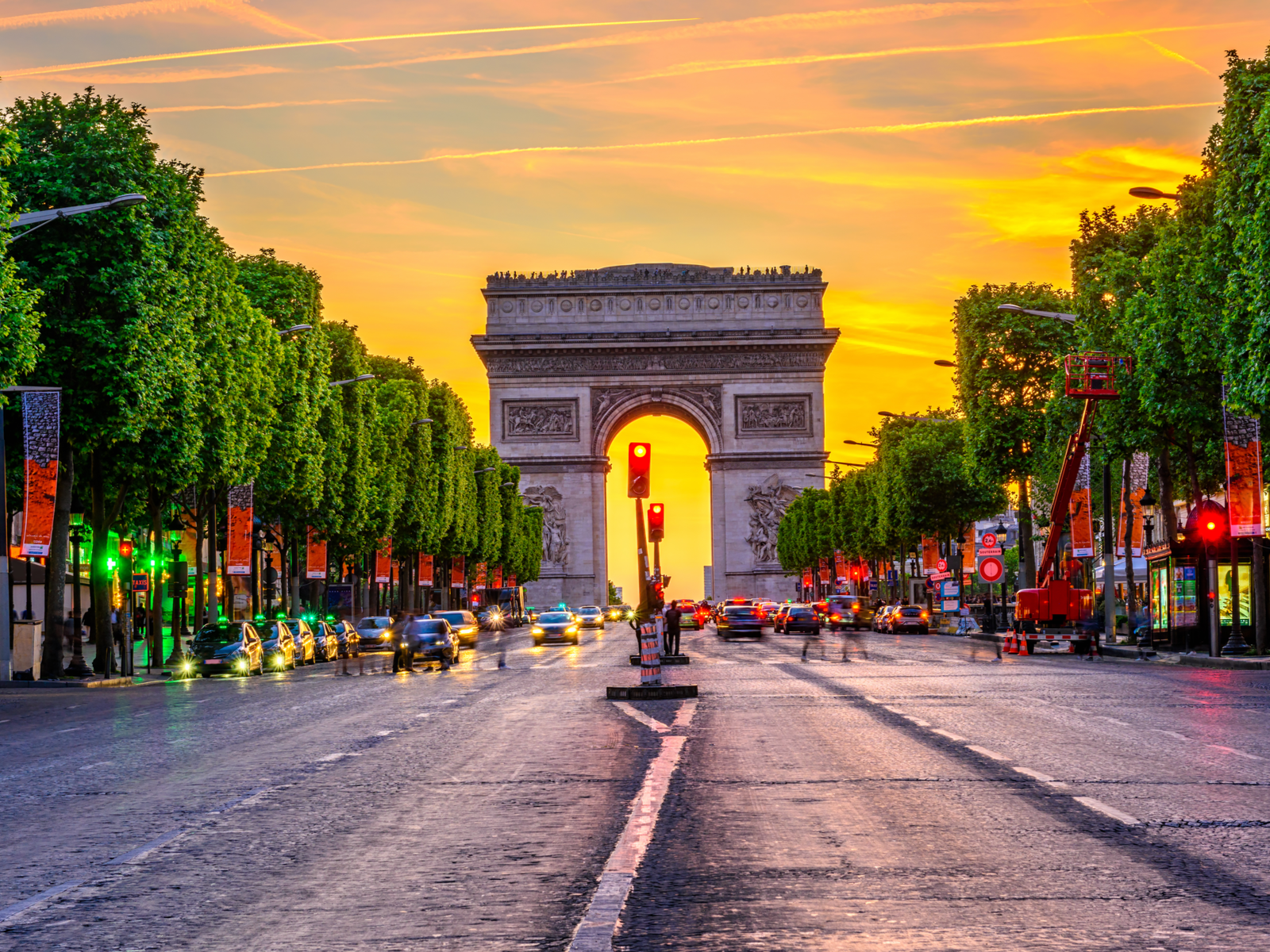 Champs-Elysees and Arc de Triomphe at night during the Summer, the best time to visit France
