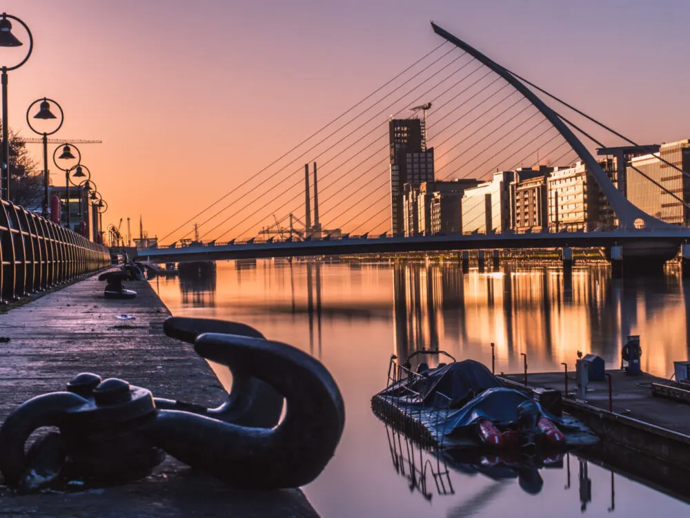 Sunrise in Dublin by the Samuel Backett Bridge during the best time to visit Ireland