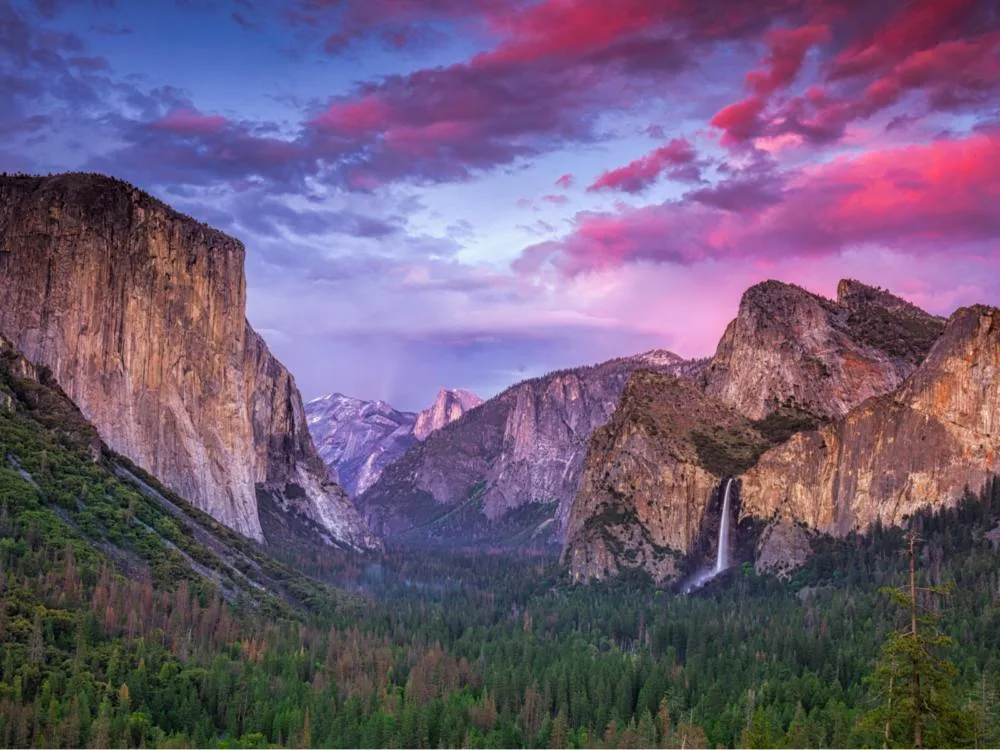 Vibrant sunset over Tunnel View in California's Yosemite National Park, one of the best things to do in California