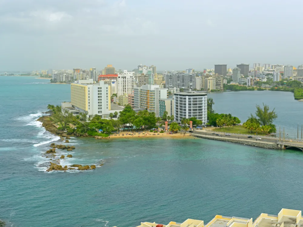 Aerial view of the small islet filled with structures in Condado District, an upper-class community in Old San Juan, Santurce, one of the best places to visit in Puerto Rico