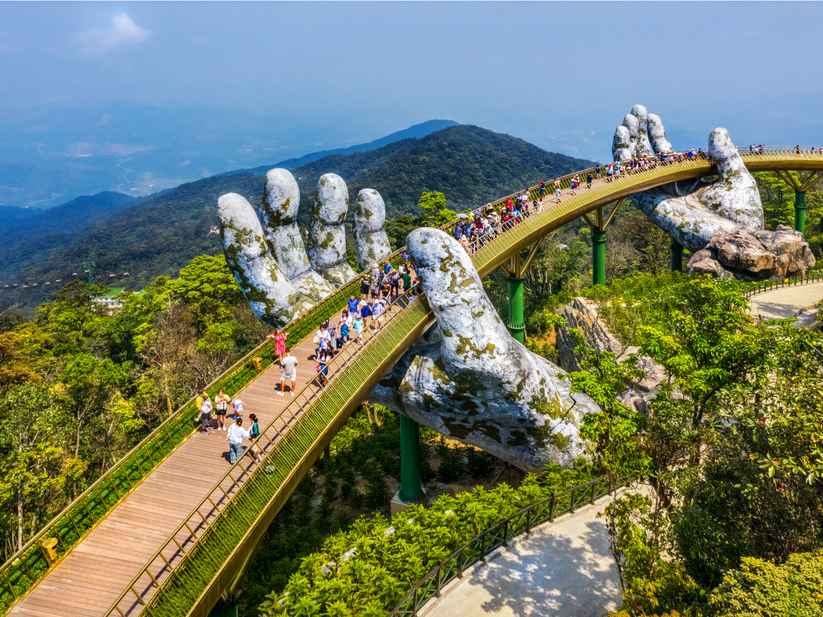 View of the Golden Bridge lifted by two giant stone hands during the best time to visit Vietnam