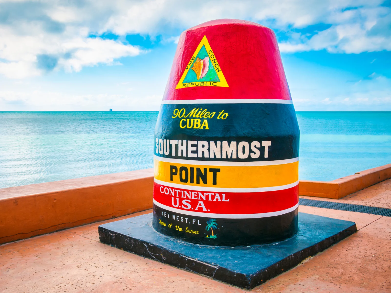 Concrete buoy pictured on a slightly cloudy day for a piece on the best time to visit the Florida Keys