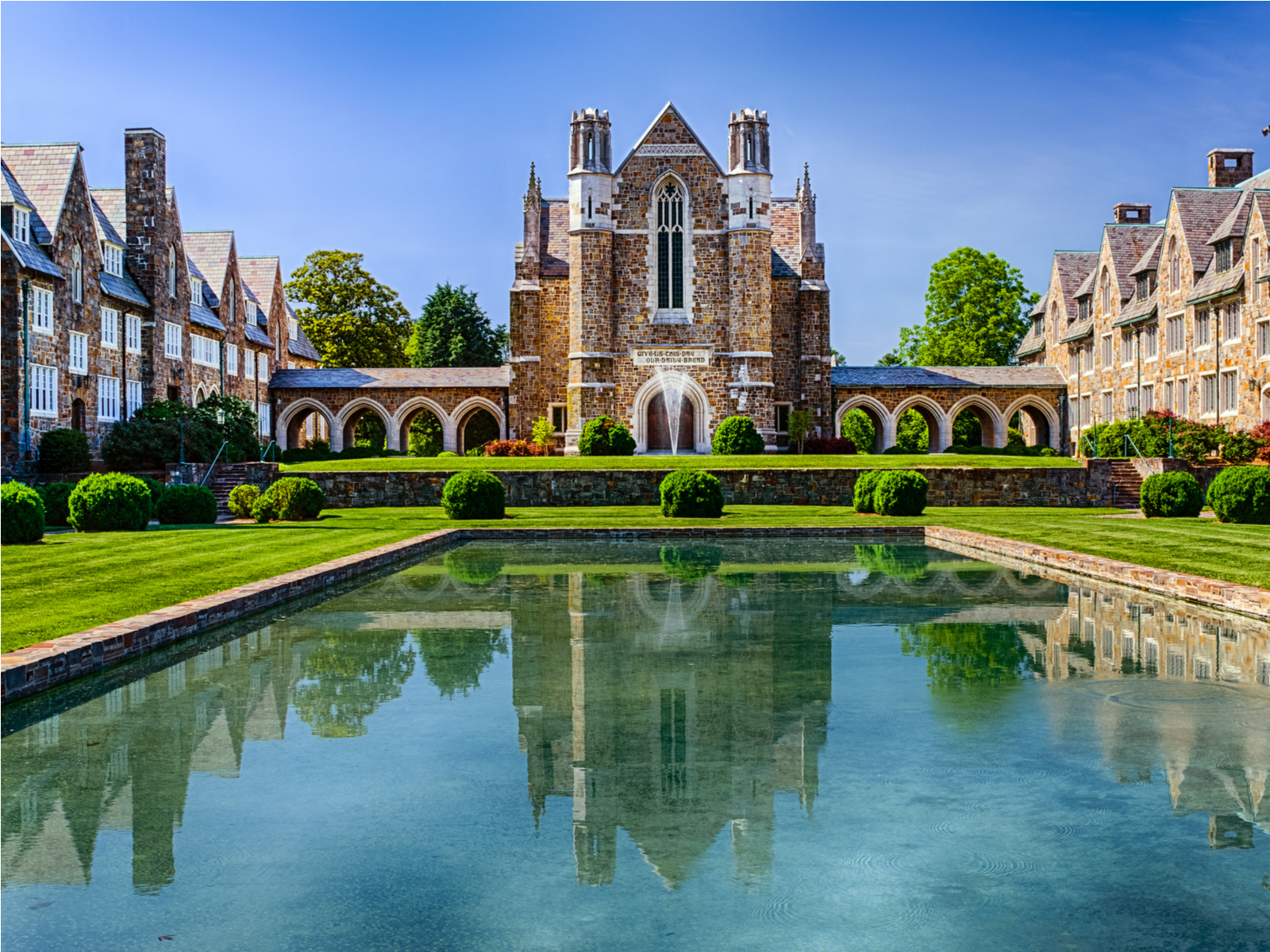 As the overall most beautiful college campus in the United States, the dining hall at Berry College in Georgie pictured with a fountain in front
