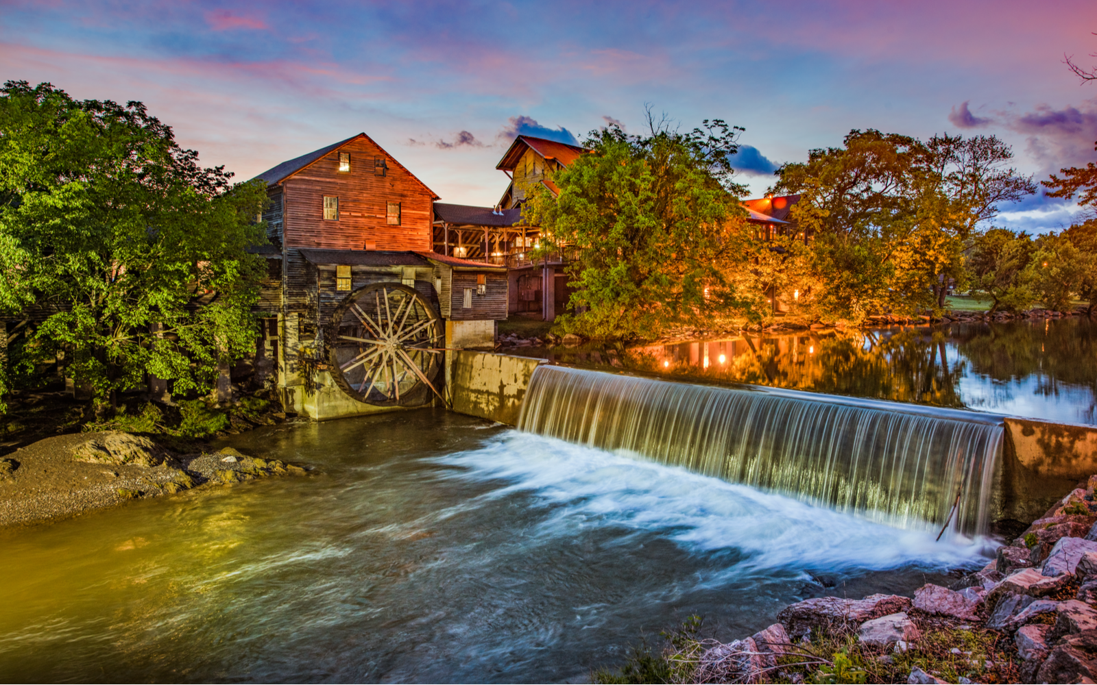 Old Mill by the river and dam for a piece titled Best Things to Do in Pigeon Forge TN