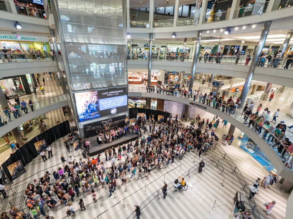 People queuing at the center stage circle at Mall of America in Minnesota, named one of the best malls in America, for the book signing of the novel Mortal Instruments and others spectating from different floors