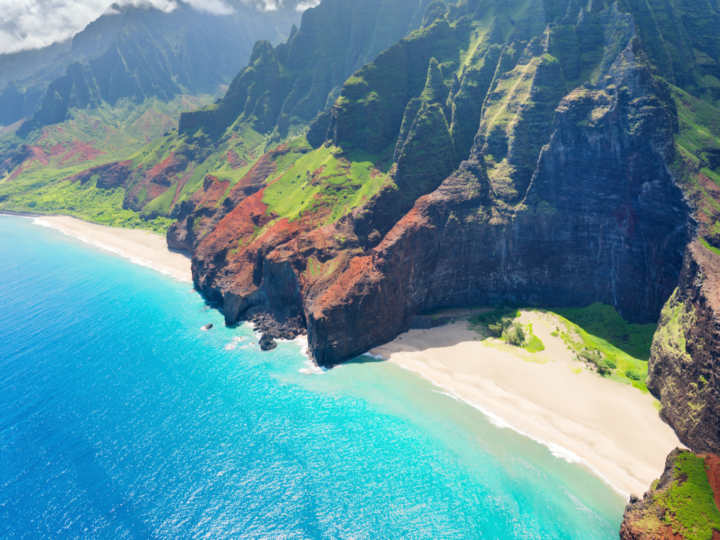 Aerial shot of the Na Pali Coast, home to some of the best beaches in Kauai
