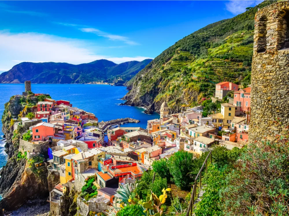 Village Vernazza and ocean coast in Cinque Terre during Summer, the best time to visit Europe
