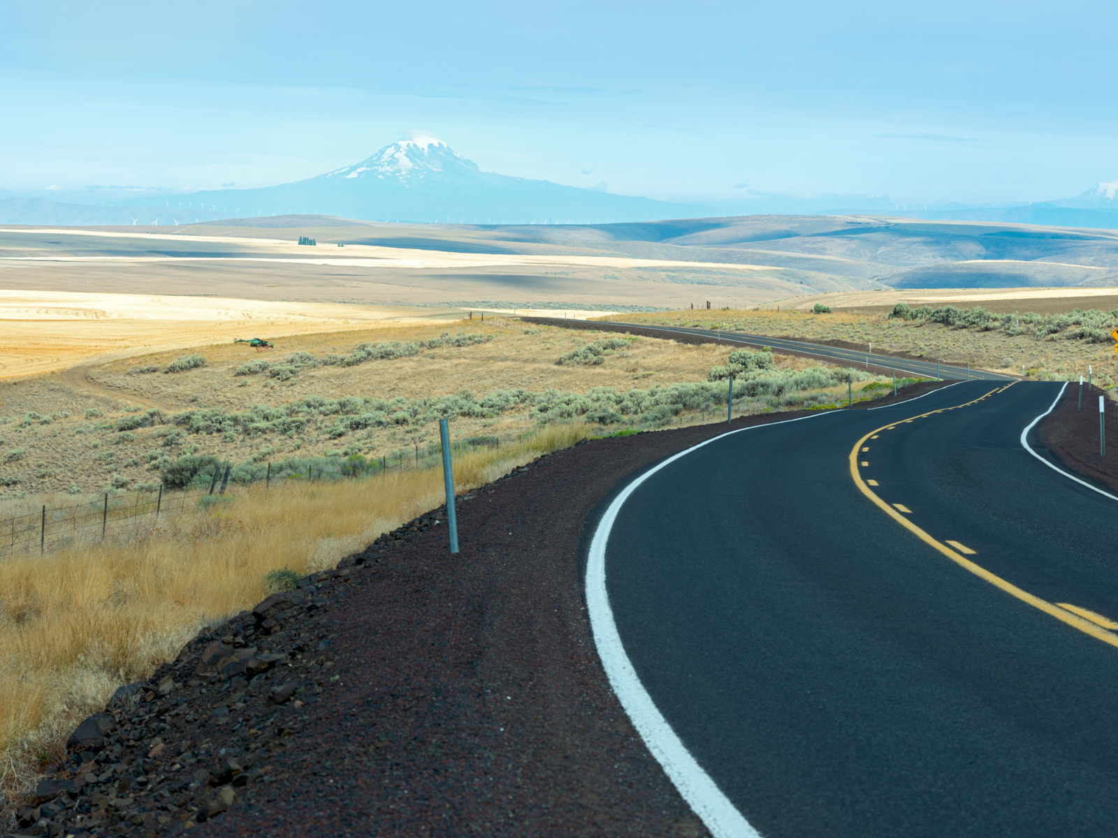 Highway 206 with Mount Hood and Mount Rainier in the distance for a piece on the best time to visit Oregon