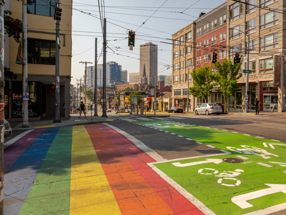 Shot of the gay flag crosswalk in Seattle during the cheapest time to visit