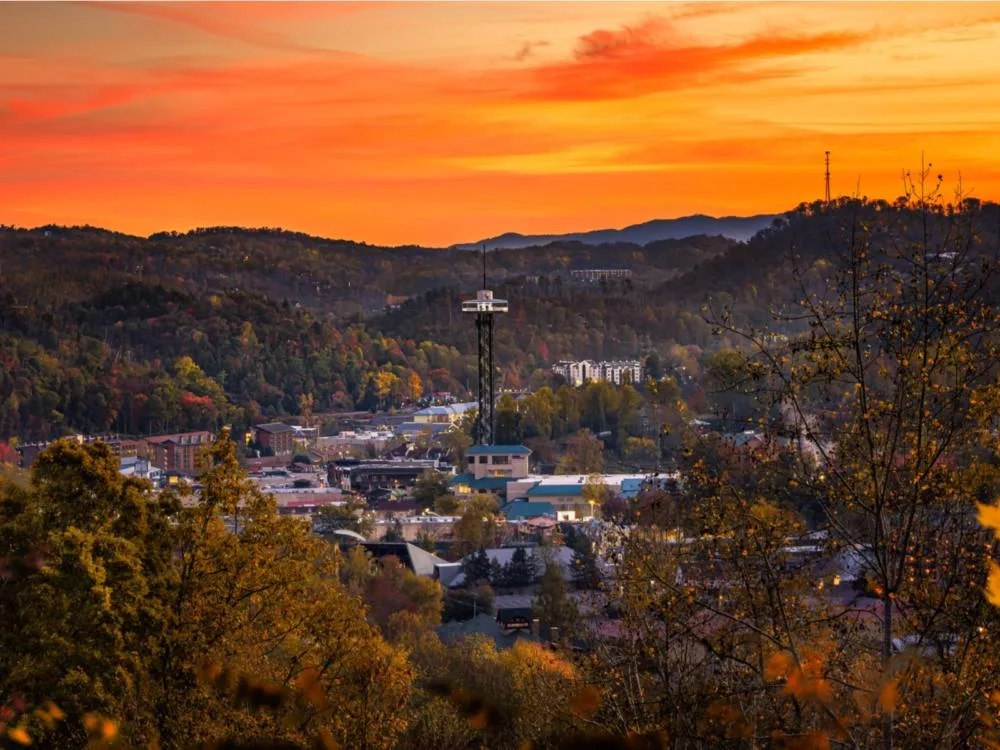 standing tall above all other buildings during a beautiful sunset, gatlinburg space needle, one of the best things to do in in gatlinburg, tennessee