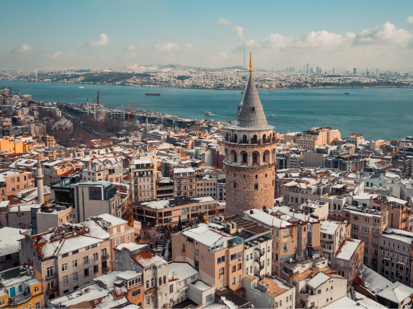 Winter shot from Istanbul at Galata Tower during the cheapest time to visit Turkey