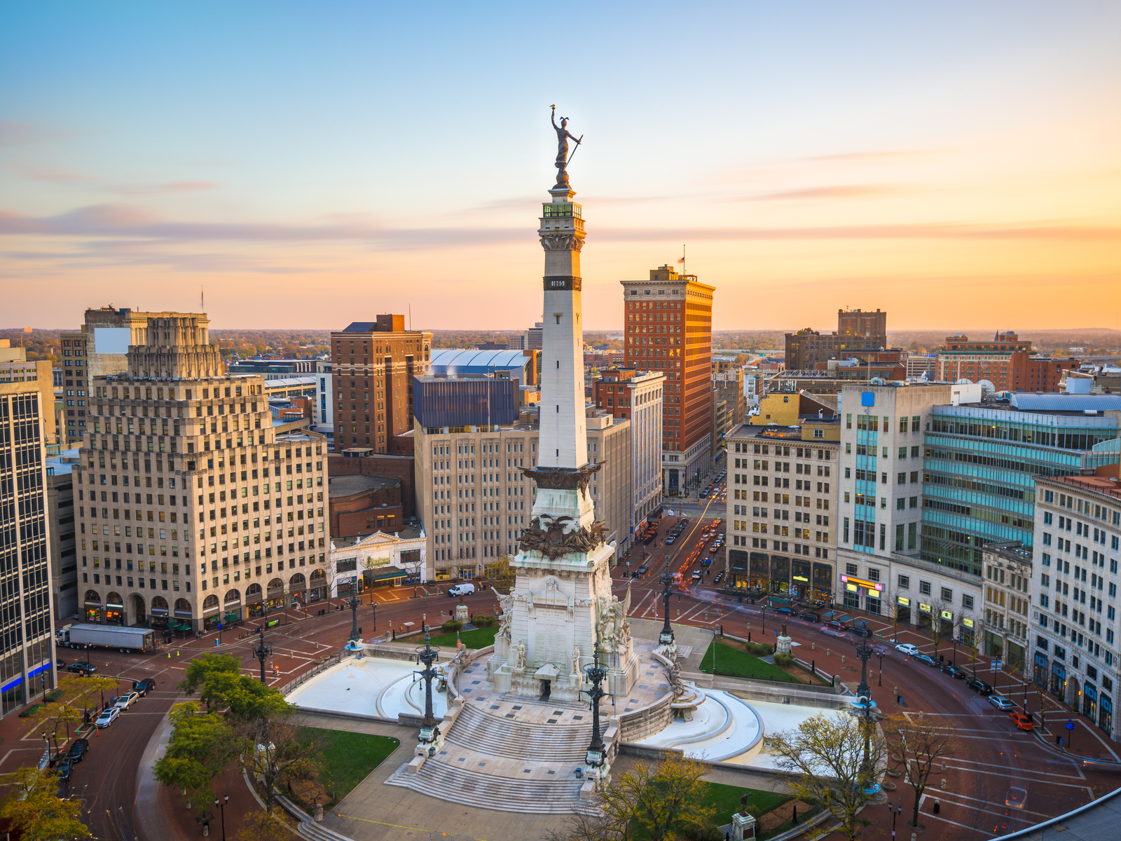 Aerial shot of the skyline over Monument Circle at dusk