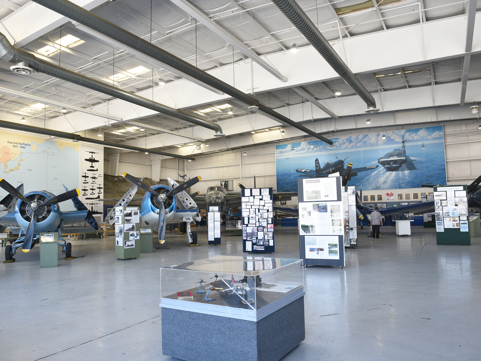 Hangar at Palm Springs Air Museum, one of the best things to do in Palm Springs, exhibits vintage planes and infographics about planes