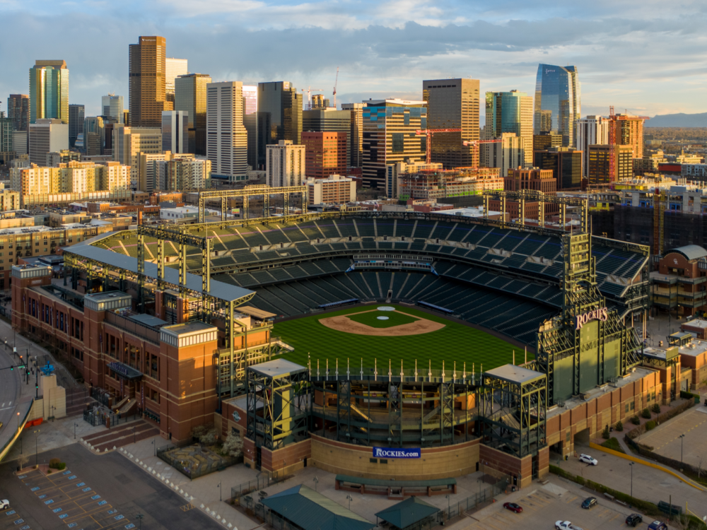 Coors Field pictured from the air in the Summer, one of the best times to visit Denver
