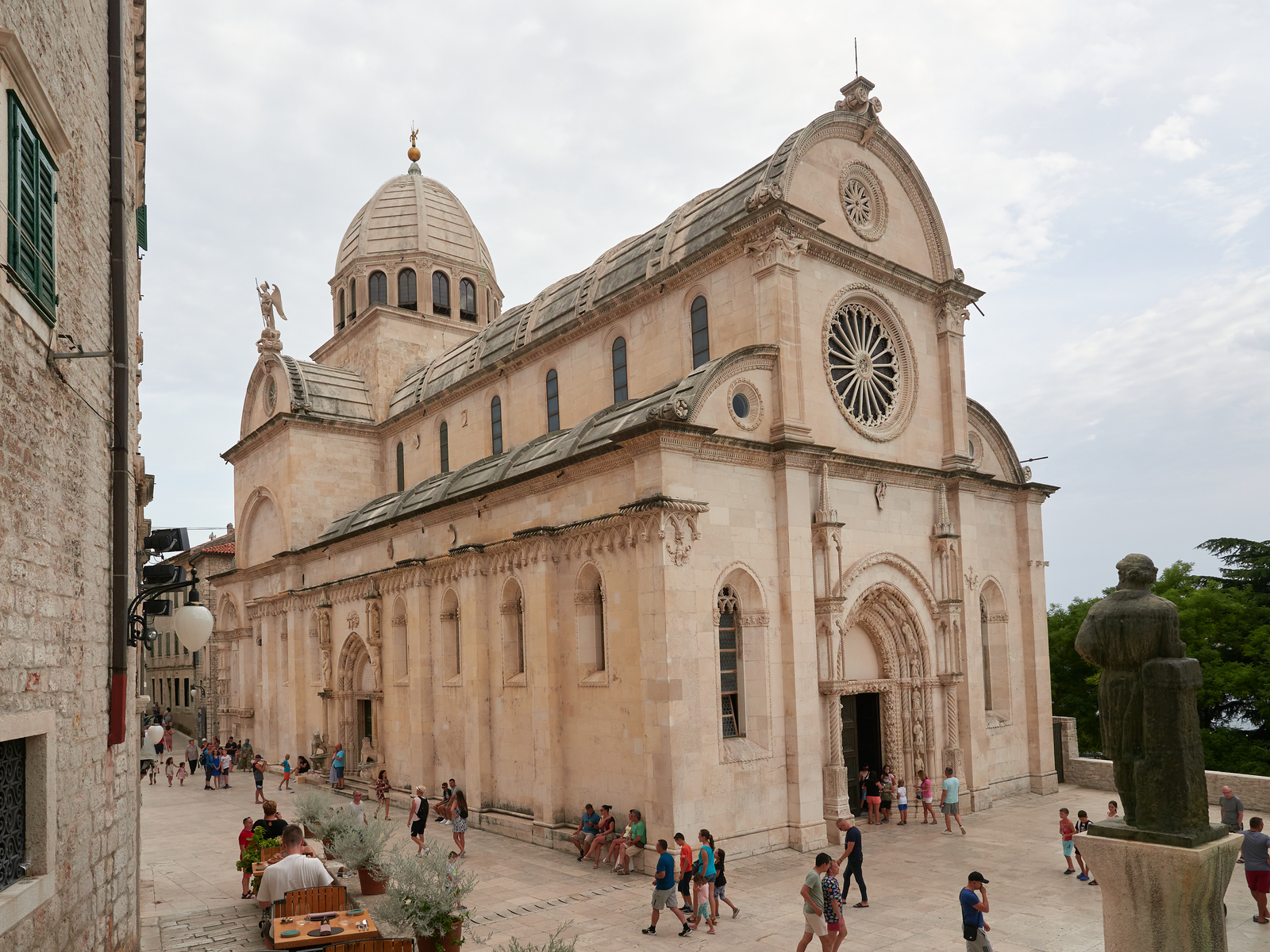 Locals strolling around near Saint James Cathedral in Šibenik, Croatia, a famous Game of Thrones filming locations you can visit